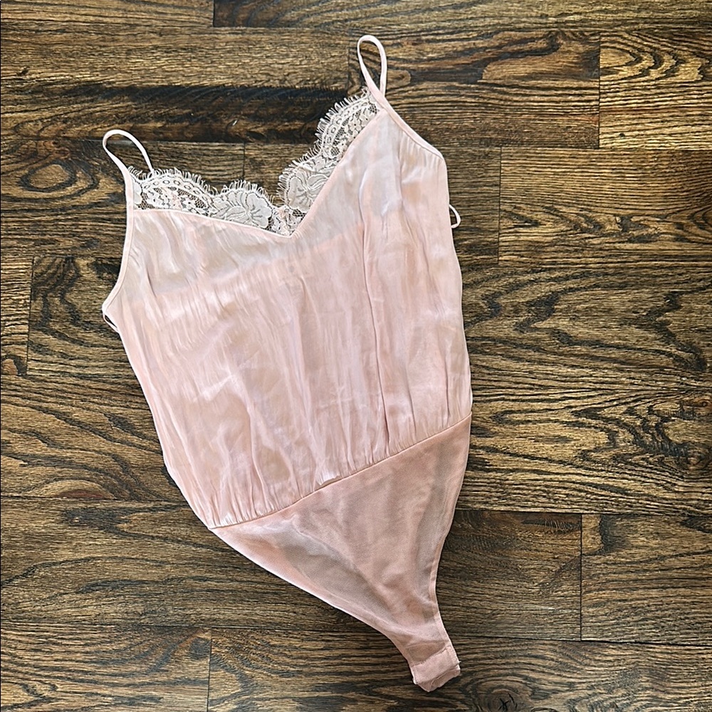 Pink Lace-Trimmed Bodysuit